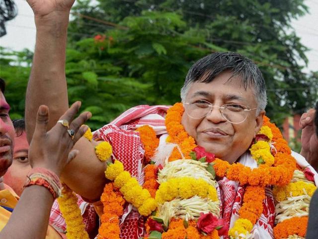 BJP candidate from east Guwahati Siddhartha Bhattacharya celebrates his victory in the state assembly elections. (PTI ) 
