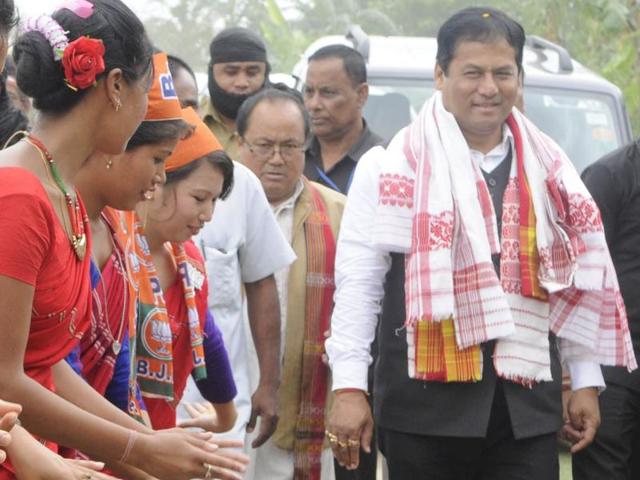 BJP leader Sarbananda Sonowal with Prime Minister Narendra Modi at an election rally in Majuli (Hindustan Times) BJP leader Sarbananda Sonowal with Prime Minister Narendra Modi at an election rally in Majuli (Hindustan Times)