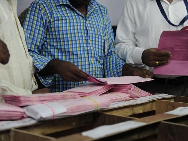 Election officials count postal ballots at a counting center in Chennai on May 19, 2016. Vote-counting is takaing place following state assembly elections in Tamil Nadu, Kerala and Pondicherry. (AFP) Election officials count postal ballots at a counting center in Chennai on May 19, 2016. Vote-counting is takaing place following state assembly elections in Tamil Nadu, Kerala and Pondicherry. (AFP)