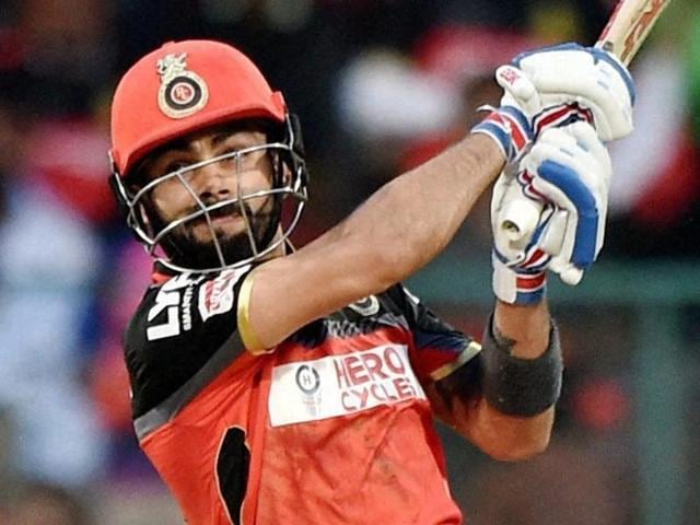Virat Kohli extended his amazing run, scoring his fourth century of the IPL season to help Royal Challengers Bangalore pile up the runs in the rain-hit game against Kings XI Punjab on Wednesday. (AFP) Virat Kohli extended his amazing run, scoring his fourth century of the IPL season to help Royal Challengers Bangalore pile up the runs in the rain-hit game against Kings XI Punjab on Wednesday. (AFP)