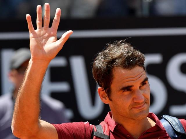Switzerland's Roger Federer waves to supporters after his match against Austria's Dominic Thiem during the Rome Masters at the Foro Italico in Rome, on May 12, 2016. (AFP) Switzerland's Roger Federer waves to supporters after his match against Austria's Dominic Thiem during the Rome Masters at the Foro Italico in Rome, on May 12, 2016. (AFP)