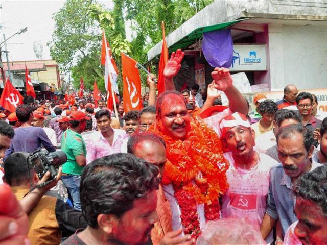 LDF workers celebrate the victory of a party candidate in the Kerala assembly elections at Ernakulam in Kochi on Thursday.(PTI)