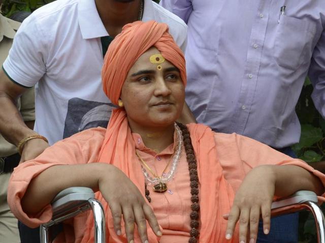 Sadhvi Pragya Singh Thakur took the holy dip at Ram ghat amid tight security, her aide Bhagwan Jha said.(HT)