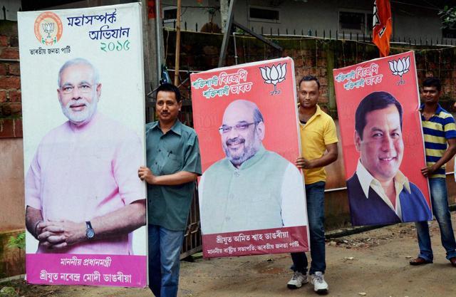 BJP workers setting up a stage at the party head office in Guwahati. (PTI) BJP workers setting up a stage at the party head office in Guwahati. (PTI)