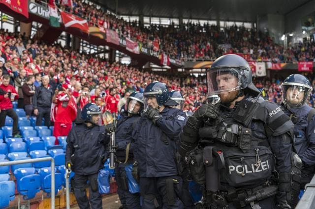Riot police moves into position ahead of the soccer Europa League final between England's Liverpool FC and Spain's Sevilla Futbol Club at the St. Jakob-Park stadium in Basel. (AP)