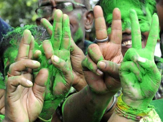 TMC supporters and workers outside the counting centre in Kolkata celebrating their assembly elections win in Kolkata. (Photo by Ashok Nath Dey/ Hindustan Times)