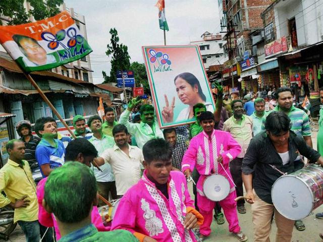Agartala: Trinamool Congress supporters celebrate the party's win in West Bengal assembly elections, in Tripura's Agartala on Thursday. (PTI)