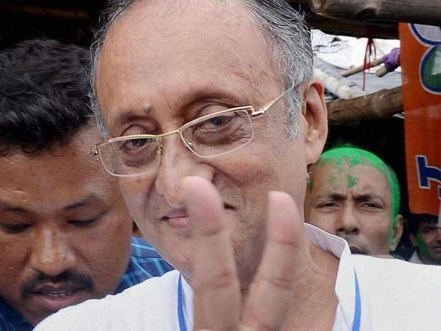 TMC candidate Amit Mitra celebrates his victory in West Bengal Assembly eections in North 24 Parganas. (PTI) 