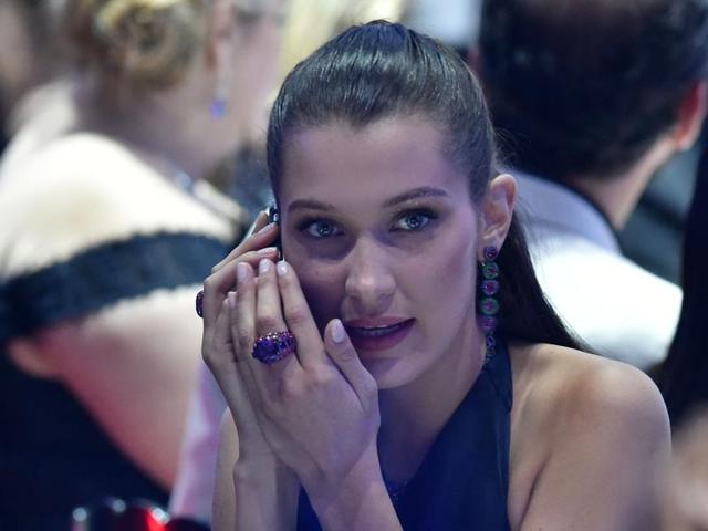 US model Bella Hadid gives a phone call. (AFP) US model Bella Hadid gives a phone call. (AFP)
