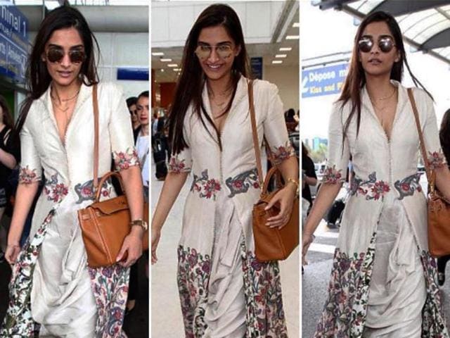 Sonam in an ivory Anamika Khanna outfit as she arrived at the Nice airport . (Instagram/L’Oreal Paris) 