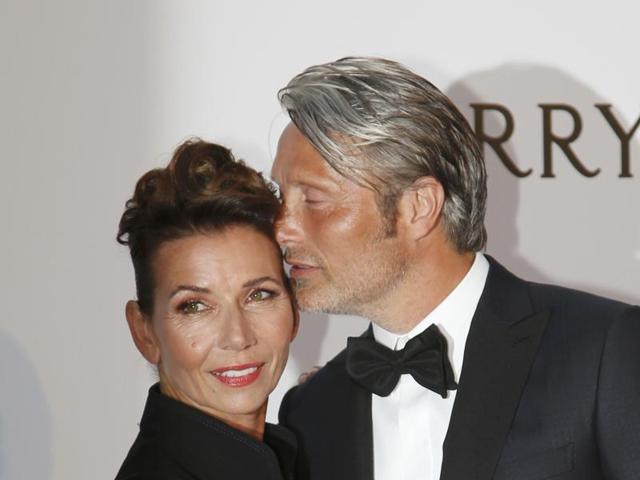 Hannibal actor Mads Mikkelsen (R) and his wife Hanne Jacobsen pose for the cameras. (REUTERS) Hannibal actor Mads Mikkelsen (R) and his wife Hanne Jacobsen pose for the cameras. (REUTERS)