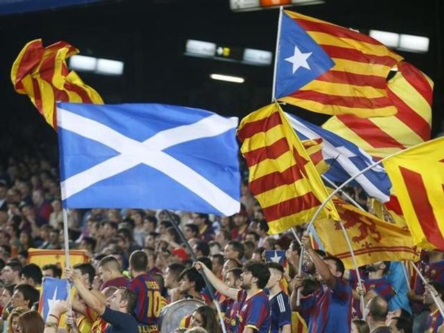 The "Esteladas" flag (yellow and red) symbolises support for Catalonia’s breakaway from the rest of Spain.(Reuters)