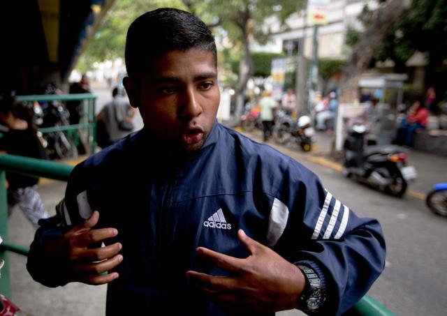 This April 7, 2016 photo shows moto-taxi driver Eduardo Mijares, who said he witnessed the beating of Roberto Bernal. (AP) This April 7, 2016 photo shows moto-taxi driver Eduardo Mijares, who said he witnessed the beating of Roberto Bernal. (AP)