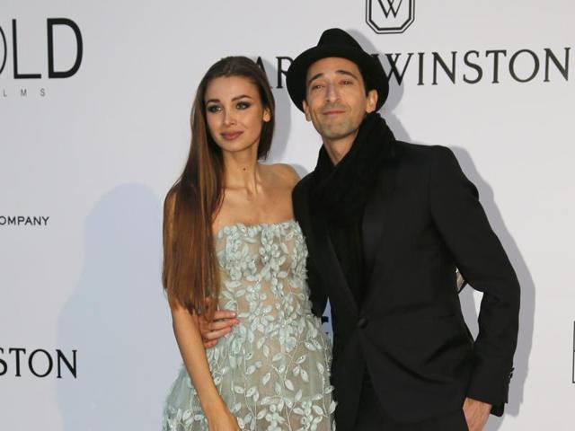 Adrien Brody (R) and Lara Lieto pose during a photocall. (REUTERS) Adrien Brody (R) and Lara Lieto pose during a photocall. (REUTERS)