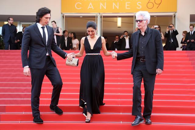 (From right) US director Jim Jarmusch, Iranian actor Golshifteh Farahani and US actor Adam Driver leave after the screening of their film Paterson at Cannes. (AFP)