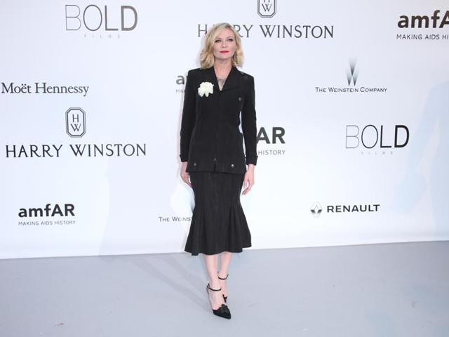 Melancholia actor Kirsten Dunst poses for photographers. (AP) Melancholia actor Kirsten Dunst poses for photographers. (AP)