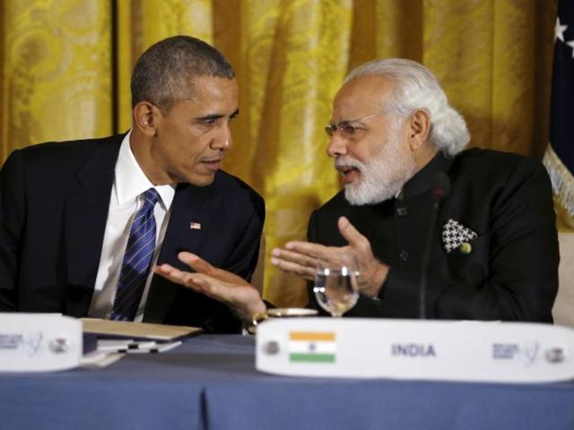 File photo of US President Barack Obama talking with Indian Prime Minister Narendra Modi during a working dinner at the White House with heads of delegations that attended the Nuclear Security Summit in Washington in March.(Reuters)