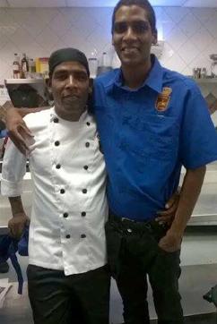 This undated picture, courtesy of Yesenia Castro, shows Roberto Bernal, left, posing for a photo with his oldest son in a restaurant in Venezuela. (Yesenia Castro) This undated picture, courtesy of Yesenia Castro, shows Roberto Bernal, left, posing for a photo with his oldest son in a restaurant in Venezuela. (Yesenia Castro)
