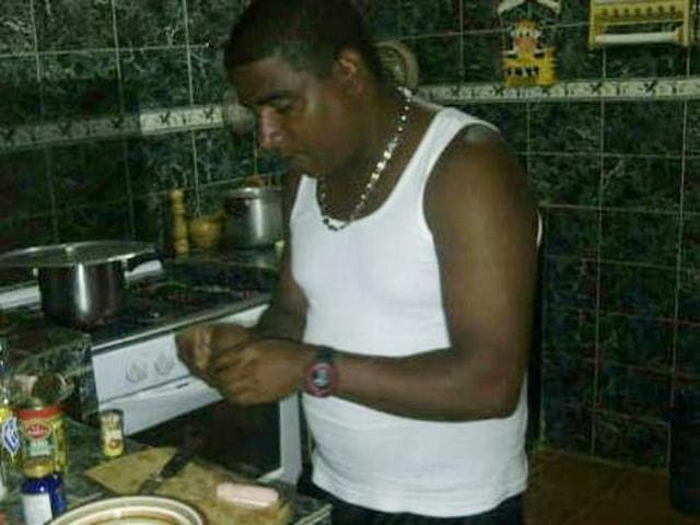 This 2013 picture, courtesy of Yesenia Castro, shows Roberto Bernal cooking in his aunt’s kitchen in Venezuela. (AP) This 2013 picture, courtesy of Yesenia Castro, shows Roberto Bernal cooking in his aunt’s kitchen in Venezuela. (AP)