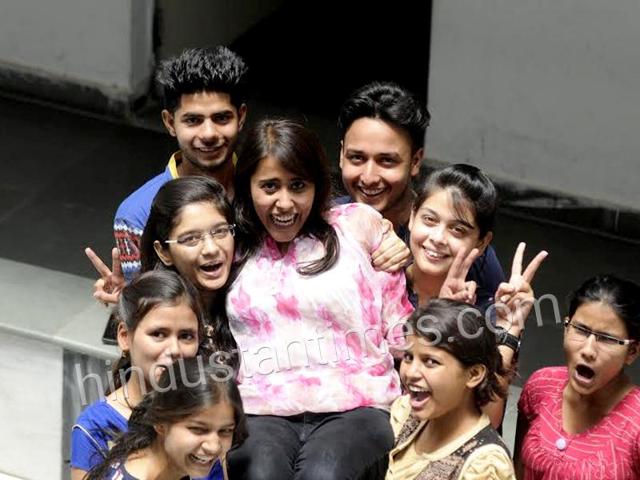 Anshul Bhadauria (middle) scored 98.6% to top the Central Board of Secondary Education (CBSE) Class 12 examinations in the Allahabad region. (Deepak Gupta/HT photo) Anshul Bhadauria (middle) scored 98.6% to top the Central Board of Secondary Education (CBSE) Class 12 examinations in the Allahabad region. (Deepak Gupta/HT photo)
