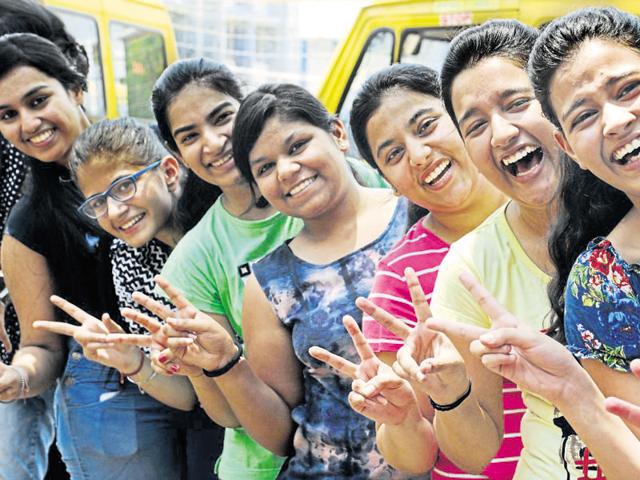 Students after the CBSE class 12th results in Blue Bells Model School Gurgaon on Saturday.(Parveen Kumar/Hindustan Times)