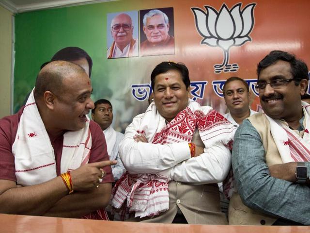 Bharatiya Janata Party’s Sarbananda Sonowal (centre), during a meeting with other leaders at the party’s office in Guwahati on Friday. (AP) Bharatiya Janata Party’s Sarbananda Sonowal (centre), during a meeting with other leaders at the party’s office in Guwahati on Friday. (AP)