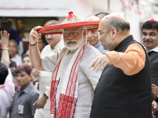 Prime Minister Narendra Modi interacts with BJP president Amit Shah at BJP headquarters in New Delhi. (Sonu Mehta/HT Photo) Prime Minister Narendra Modi interacts with BJP president Amit Shah at BJP headquarters in New Delhi. (Sonu Mehta/HT Photo)