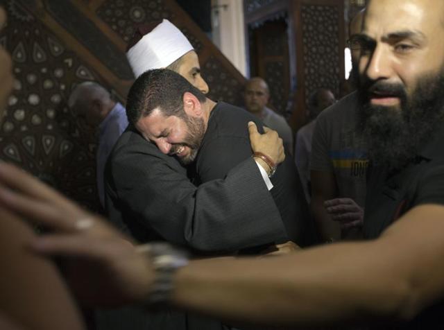 Tarek Abu Laban, centre, who lost four relatives, all victims of Thursday's EgyptAir plane crash, attends prayers for the dead, at al Thawrah Mosque, in Cairo, Egypt. (AP Photo) Tarek Abu Laban, centre, who lost four relatives, all victims of Thursday's EgyptAir plane crash, attends prayers for the dead, at al Thawrah Mosque, in Cairo, Egypt. (AP Photo)