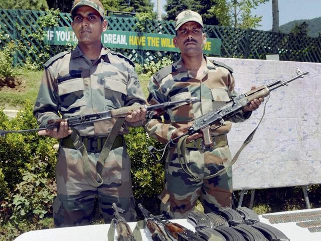 Army officers display the arms and ammunition recovered from the five militants who were killed in an encounter in J-K’s Kupwara on May 21, 2016. One of the two army soldiers, injured in the gunbattle, succumbed to his injuries on Sunday. (PTI) Army officers display the arms and ammunition recovered from the five militants who were killed in an encounter in J-K’s Kupwara on May 21, 2016. One of the two army soldiers, injured in the gunbattle, succumbed to his injuries on Sunday. (PTI)