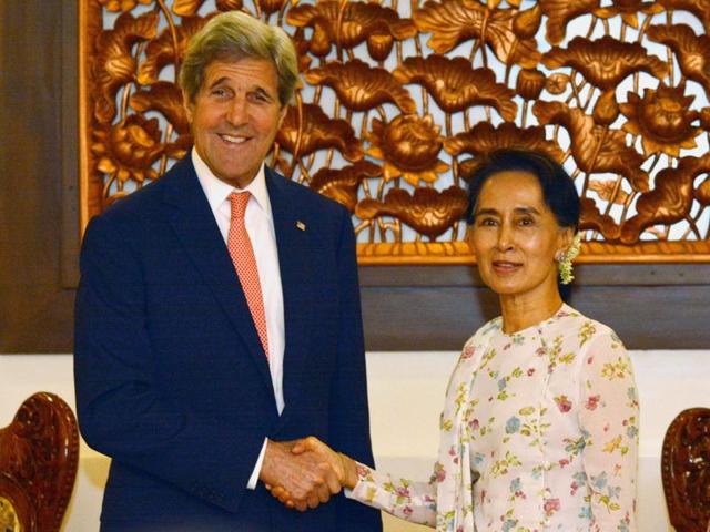 US Secretary of State John Kerry shakes hands with Myanmar's foreign minister Aung San Suu Kyi during their meeting in Myanmar's capital Naypyidaw on Sunday. (AFP) US Secretary of State John Kerry shakes hands with Myanmar's foreign minister Aung San Suu Kyi during their meeting in Myanmar's capital Naypyidaw on Sunday. (AFP)