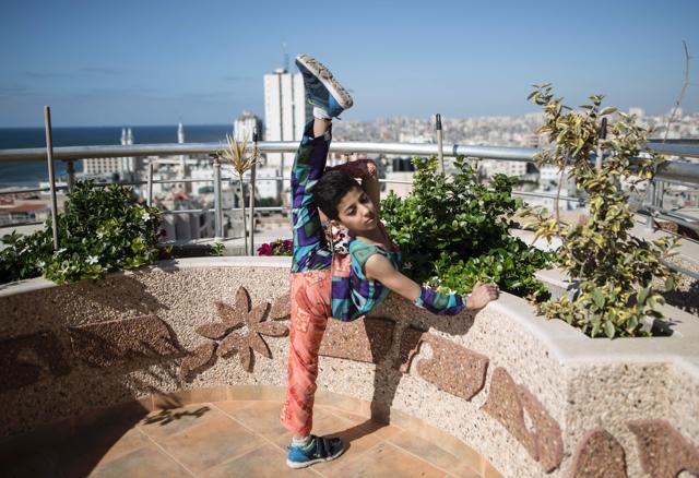 Mohammed, just 1.37 metres (four foot, six inches) tall and weighing 29 kilograms (64 pounds), can bend his body in seemingly impossible ways. (AFP Photo) Mohammed, just 1.37 metres (four foot, six inches) tall and weighing 29 kilograms (64 pounds), can bend his body in seemingly impossible ways. (AFP Photo)