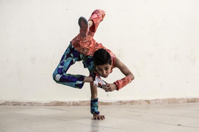 Mohammed dreams of travelling the world and breaking the Guinness world record for a series of stunning backflips and unbelievable body contortions. (AFP Photo) Mohammed dreams of travelling the world and breaking the Guinness world record for a series of stunning backflips and unbelievable body contortions. (AFP Photo)