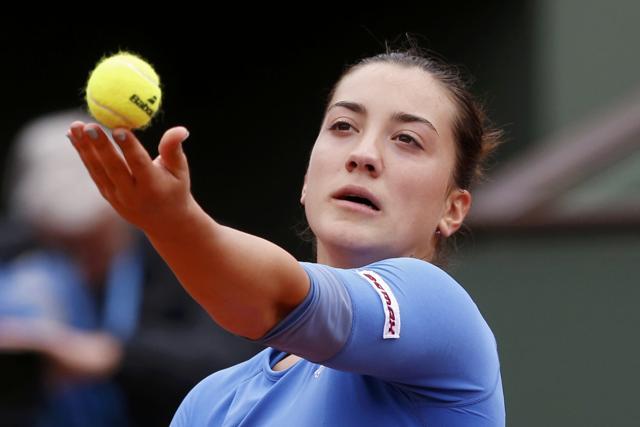 Danka Kovinic serves. (REUTERS)