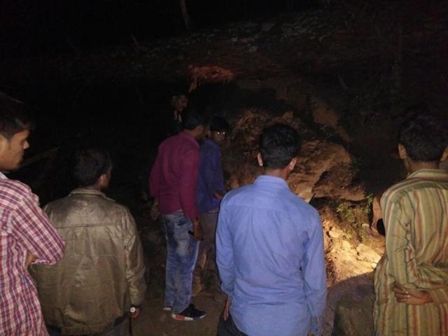 At least 10 Nepali workers were crushed to death in Dehradun after trees and debris fell on their shanty due to a storm and heavy rains in the area (HT Photo) At least 10 Nepali workers were crushed to death in Dehradun after trees and debris fell on their shanty due to a storm and heavy rains in the area (HT Photo)