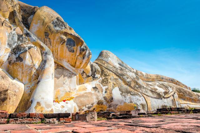 A giant Buddha statue in the historical Park of Ayutthaya, Phra Nakhon Si Ayutthaya, Thailand. (Shutterstock) A giant Buddha statue in the historical Park of Ayutthaya, Phra Nakhon Si Ayutthaya, Thailand. (Shutterstock)