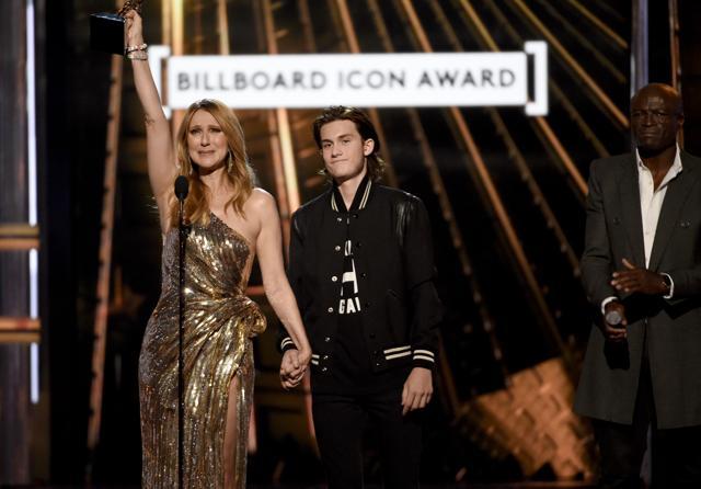 Rene-Charles Angelil presents the Icon Award to his mother, Celine Dion, at the Billboard Music Awards at the T-Mobile Arena on Sunday in Las Vegas. (Chris Pizzello/Invision/AP)