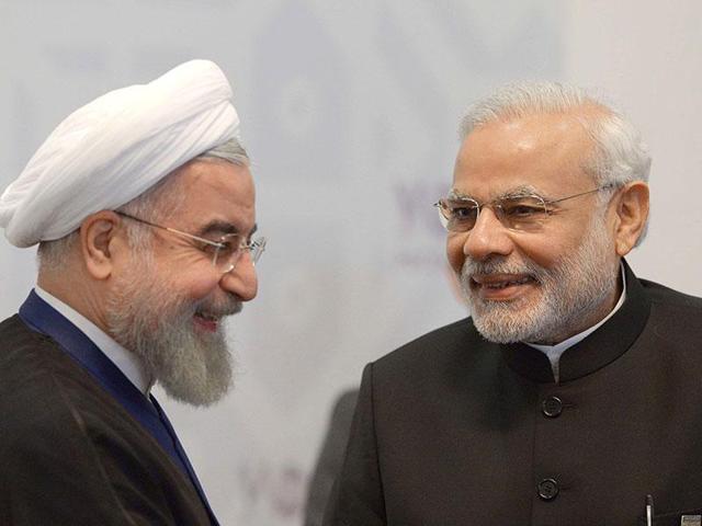 Iran's President Hassan Rouhani (L) meets with PM Modi in Ufa on the sidelines of a summit of the BRICS. As the two leaders look at renewed ties, energy and infrastructure investments are high on the agenda. (AFP) Iran's President Hassan Rouhani (L) meets with PM Modi in Ufa on the sidelines of a summit of the BRICS. As the two leaders look at renewed ties, energy and infrastructure investments are high on the agenda. (AFP)