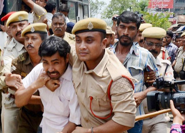 Police arrest the activists of Krishak Mukti Sangram Samity (KMSS) members during their hunger strike against the National Eligibility Entrance Test (NEET) and reinstating the combined entrance examination (CEE) in front of the directorate of health education in Guwahati on Monday. (PTI file photo) Police arrest the activists of Krishak Mukti Sangram Samity (KMSS) members during their hunger strike against the National Eligibility Entrance Test (NEET) and reinstating the combined entrance examination (CEE) in front of the directorate of health education in Guwahati on Monday. (PTI file photo)