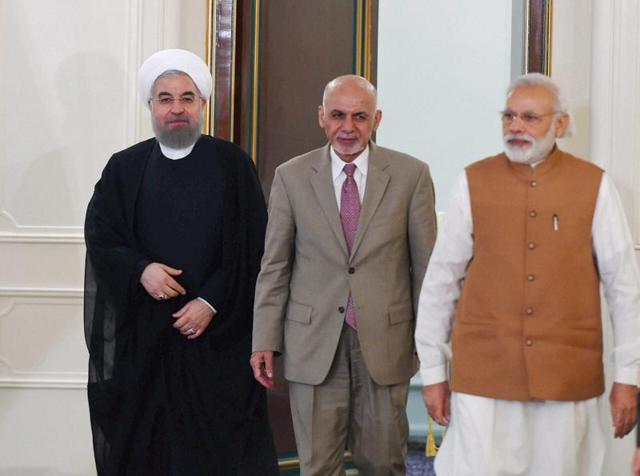 Prime Minister Narender Modi with Iranian President Hassan Rouhani and Ashraf Ghani, President of Afghanistan during agreement signing and press statement after Trilateral meeting at Talar building.(PTI)