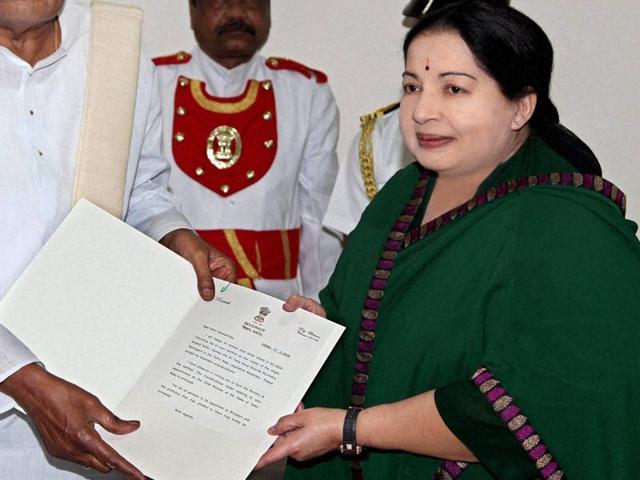 Chief minister J Jayalalithaa calling on governor K Rosaiah to stake claim to forming the next government on May 21. She was sworn in on Monday morning, beginning her sixth stint as Tamil Nadu’s chief minister.(PTI)