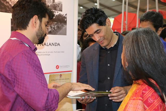Manish Malhotra appreciating a communication design student’s work. (Pearl Academy) Manish Malhotra appreciating a communication design student’s work. (Pearl Academy)