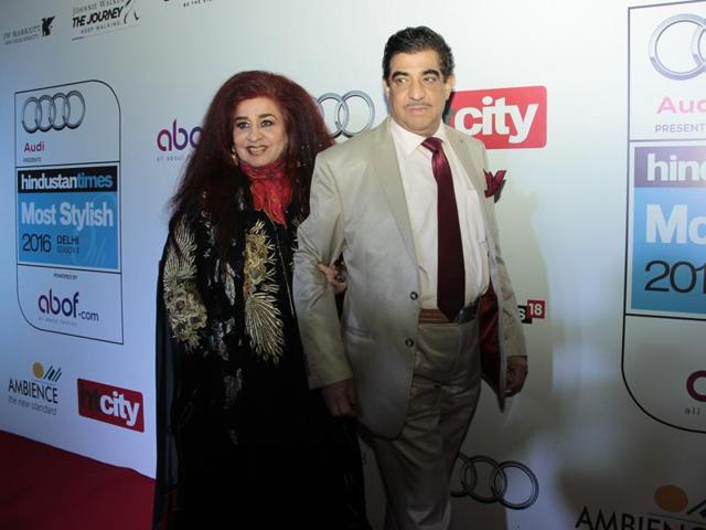 Shahnaz Husain did not give up her characteristic look and she wore pretty much what we expected. Here, she is with husband Raj Kumar Puri. (Shivam Saxena/HT) 