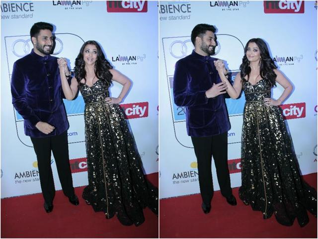Arguably Bollywood’s most good-looking couple, Aishwarya Rai and Abhishek Bachchan share a light moment at the red carpet. (Shivam Saxena/HT) Arguably Bollywood’s most good-looking couple, Aishwarya Rai and Abhishek Bachchan share a light moment at the red carpet. (Shivam Saxena/HT)