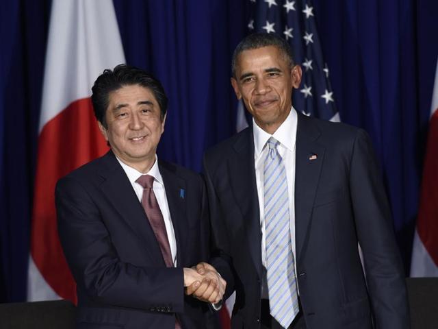 US President Barack Obama, right, and Japan's Prime Minister Shinzo Abe, left, shake hands during a bilateral meeting at the Asia-Pacific Economic Cooperation summit in Manila, Philippines. (AP) US President Barack Obama, right, and Japan's Prime Minister Shinzo Abe, left, shake hands during a bilateral meeting at the Asia-Pacific Economic Cooperation summit in Manila, Philippines. (AP)