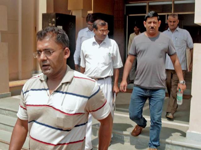 CBI team at the central office of Visva Bharati University during an investigation against former vice-chancellor Sushanta Dattagupta for financial irregularities, at Shantiniketan in Birbhum district of West Bengal. (PTI Photo) CBI team at the central office of Visva Bharati University during an investigation against former vice-chancellor Sushanta Dattagupta for financial irregularities, at Shantiniketan in Birbhum district of West Bengal. (PTI Photo)