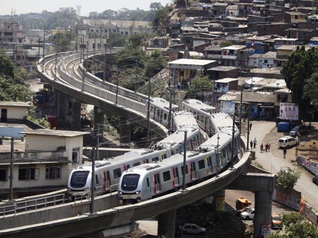 Mumbai, India, June, 08, 2014: The wait of Mumbaikars for metro services in the city came to an end the first service from Ghatkopar station in the western suburb today. ,India, June, 08, 2014 (Photo By Praful Gangurde) (Praful Gangurde) Mumbai, India, June, 08, 2014: The wait of Mumbaikars for metro services in the city came to an end the first service from Ghatkopar station in the western suburb today. ,India, June, 08, 2014 (Photo By Praful Gangurde) (Praful Gangurde)