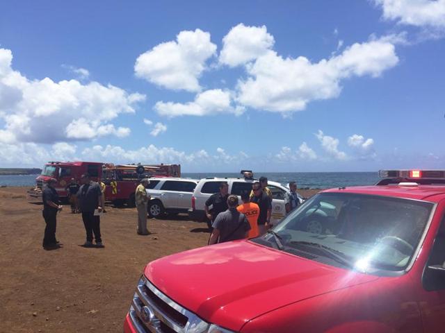 This photo provided by Kauai County shows emergency response vehicles near the site of a plane crash in Hanapepe, Hawaii. (AP) This photo provided by Kauai County shows emergency response vehicles near the site of a plane crash in Hanapepe, Hawaii. (AP)