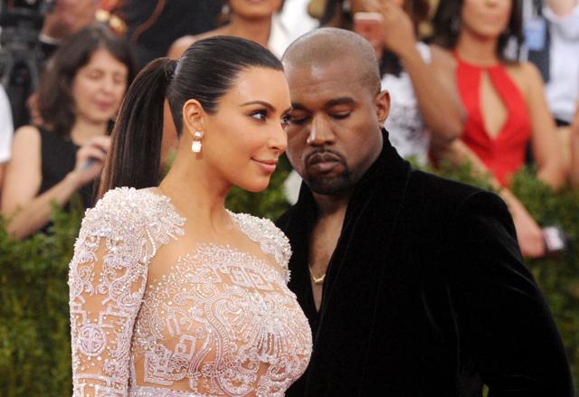 Kim Kardashian, left, and Kanye West arrive at The Metropolitan Museum of Art's Costume Institute benefit gala in New York. (AP)