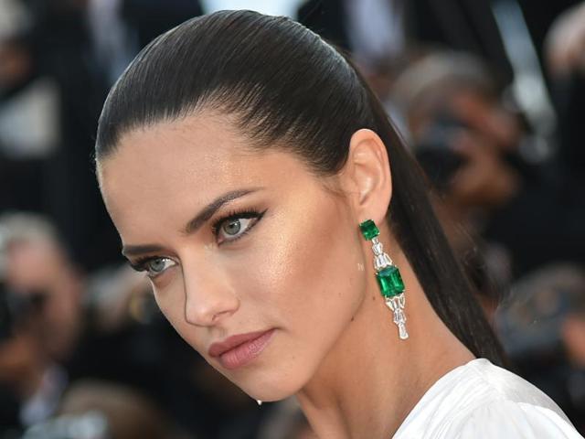 Adriana Lima: The model picked diamonds and emeralds to accessorize her white dress, with a pair of Chopard earrings. (AFP) Adriana Lima: The model picked diamonds and emeralds to accessorize her white dress, with a pair of Chopard earrings. (AFP)
