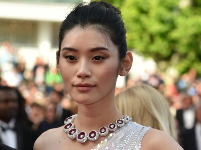 Ming Xi: The Chinese model wore an imposing De Grisogono necklace on the Cannes red carpet, bringing a touch of colour to her look. (AFP) Ming Xi: The Chinese model wore an imposing De Grisogono necklace on the Cannes red carpet, bringing a touch of colour to her look. (AFP)